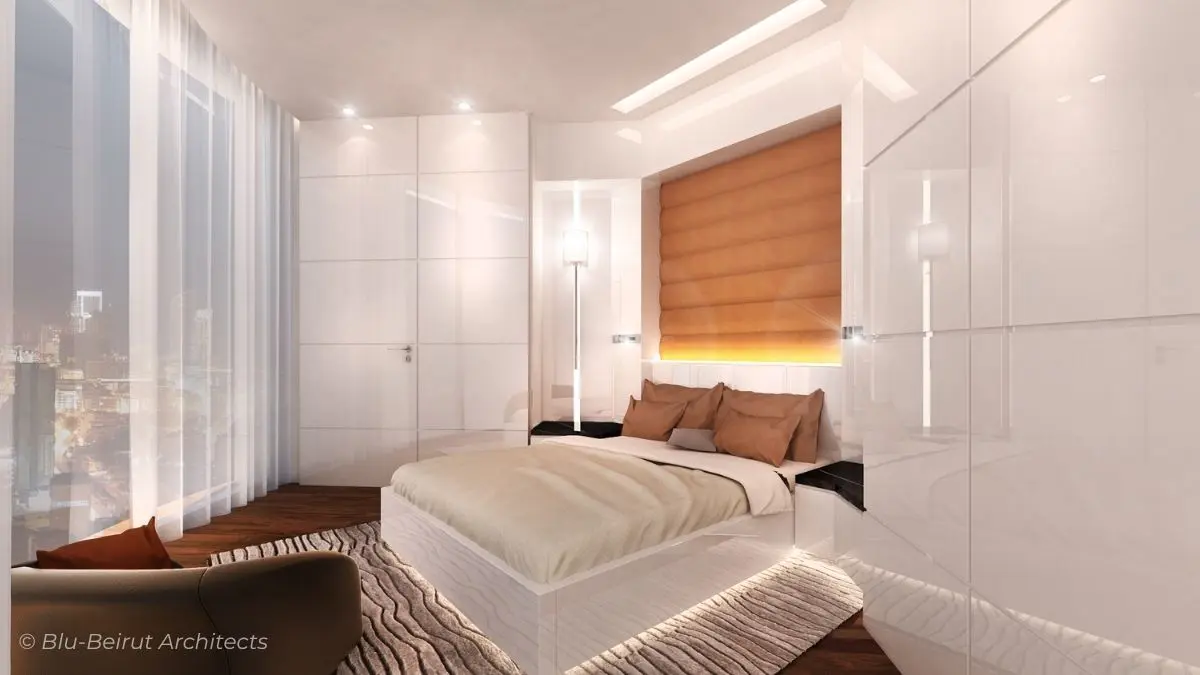 Guest bedroom design with minimalist styling, wood flooring, and soft neutrals for a tranquil atmosphere.