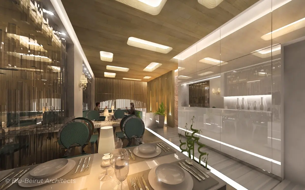 Stylish dining area with sculpted mirrors, warm lighting, and modern finishes – upscale restaurant interior by Blu Beirut Architects in Saudi Arabia.