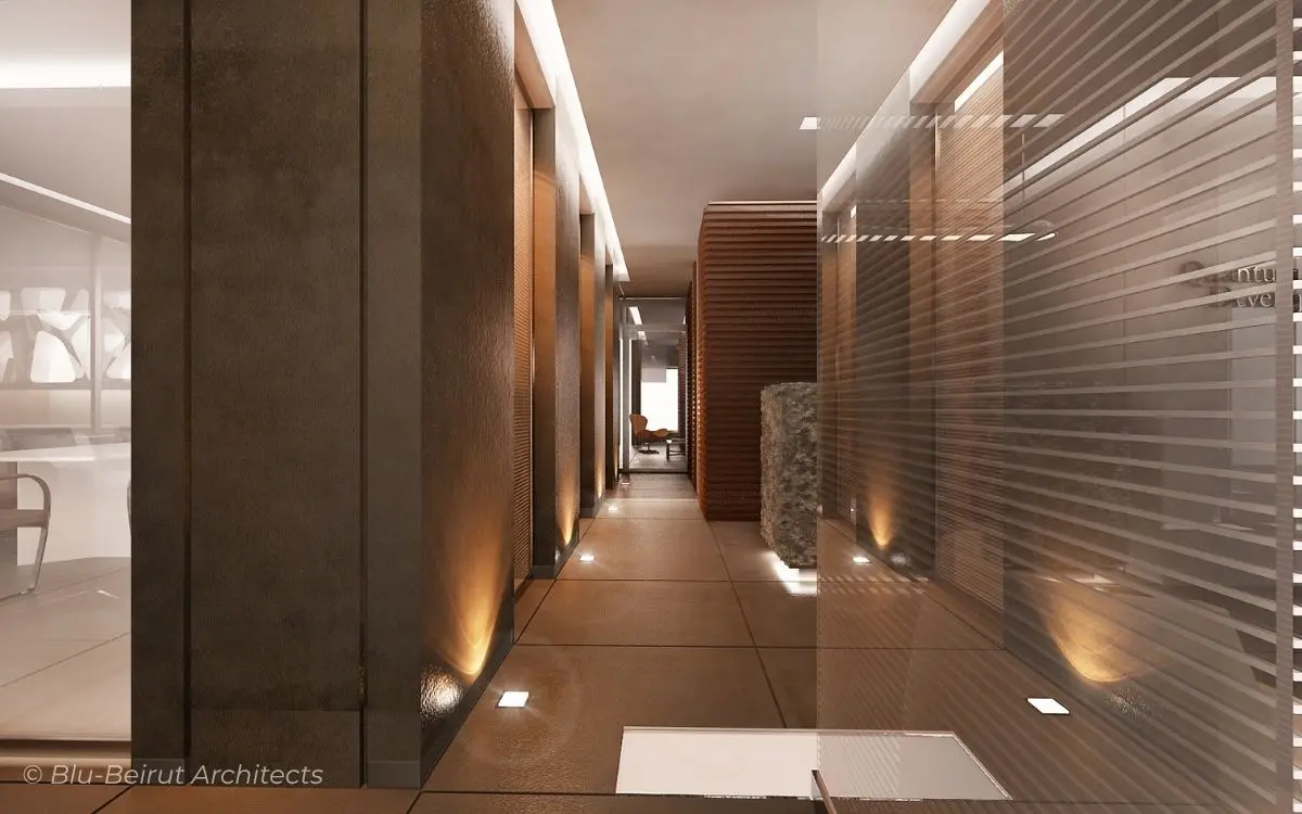 Office corridor showcasing a balance of transparency and privacy using vertical wooden slats and warm accent lighting.