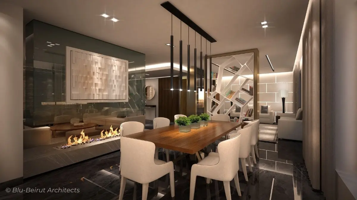 Dining area with sculptural glass fireplace hood