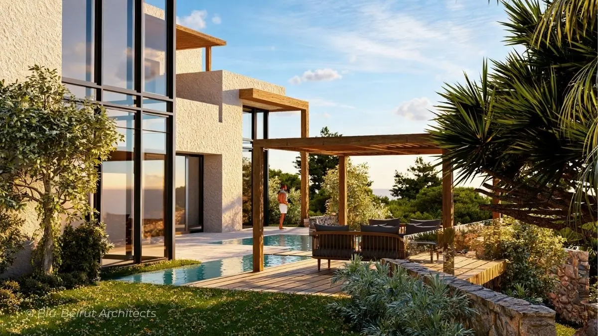 Interior garden view with natural stone walls and floor-to-ceiling windows