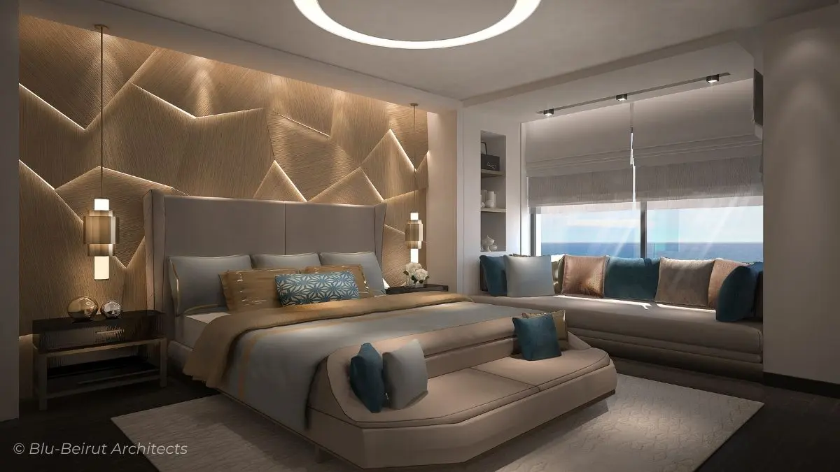 Master bedroom with oak headboard feature wall and alcove daybed overlooking the sea