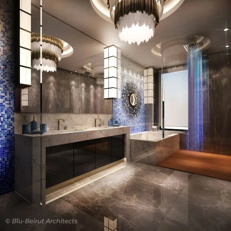 Luxurious master bathroom with dark marble flooring, mosaic walls, and brass suspension light