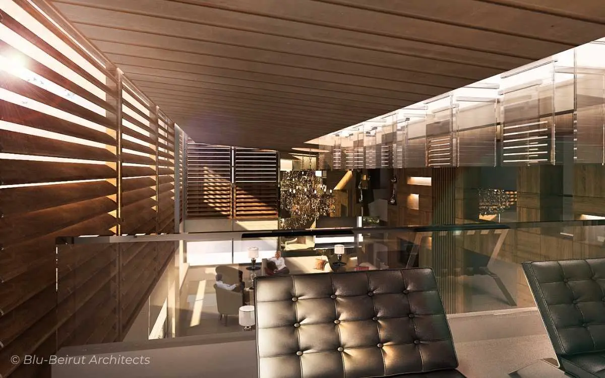 Warm-toned lounge with large windows and glazed façade